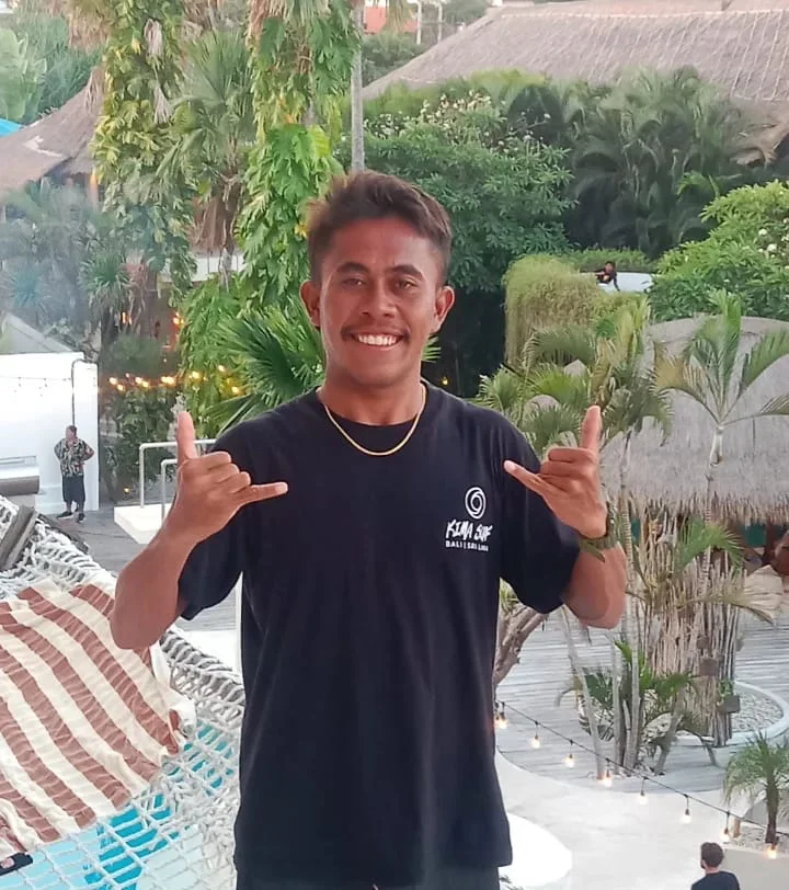 Surf instructor and student in Kuta, Bali